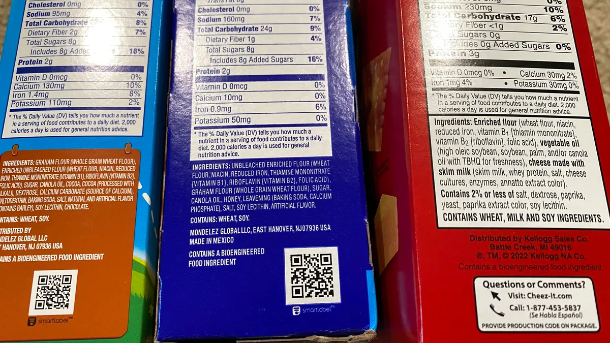 Labeling information for three boxes of food lying next to each other, all of which have been made with bioengineered ingredients.
