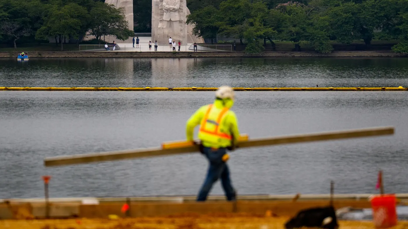 A construction walks on the construction site of the Tidal Basin project in Washington, D.C.