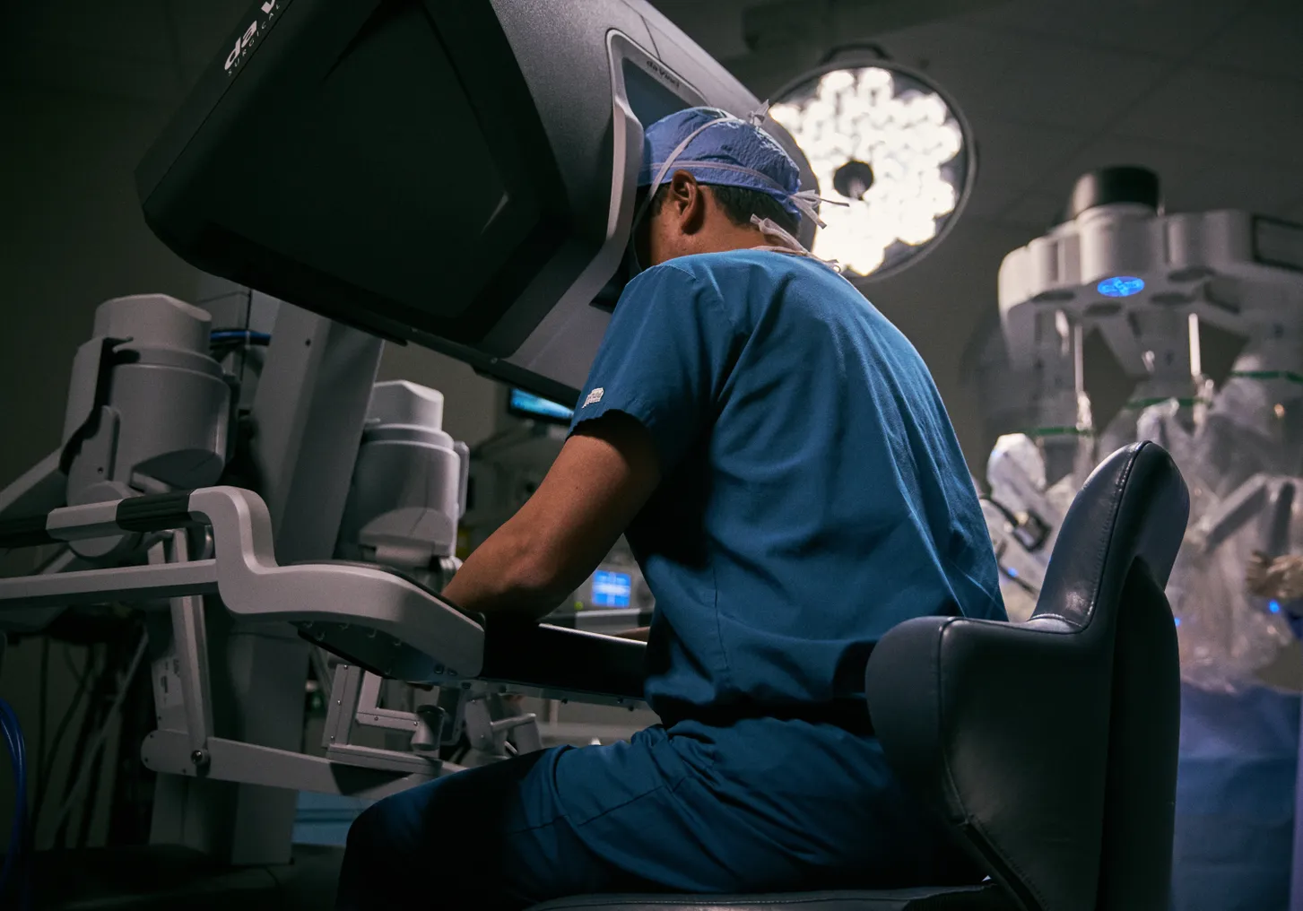 Intuitive Surgical da Vinci robot, surgeon at surgeon console