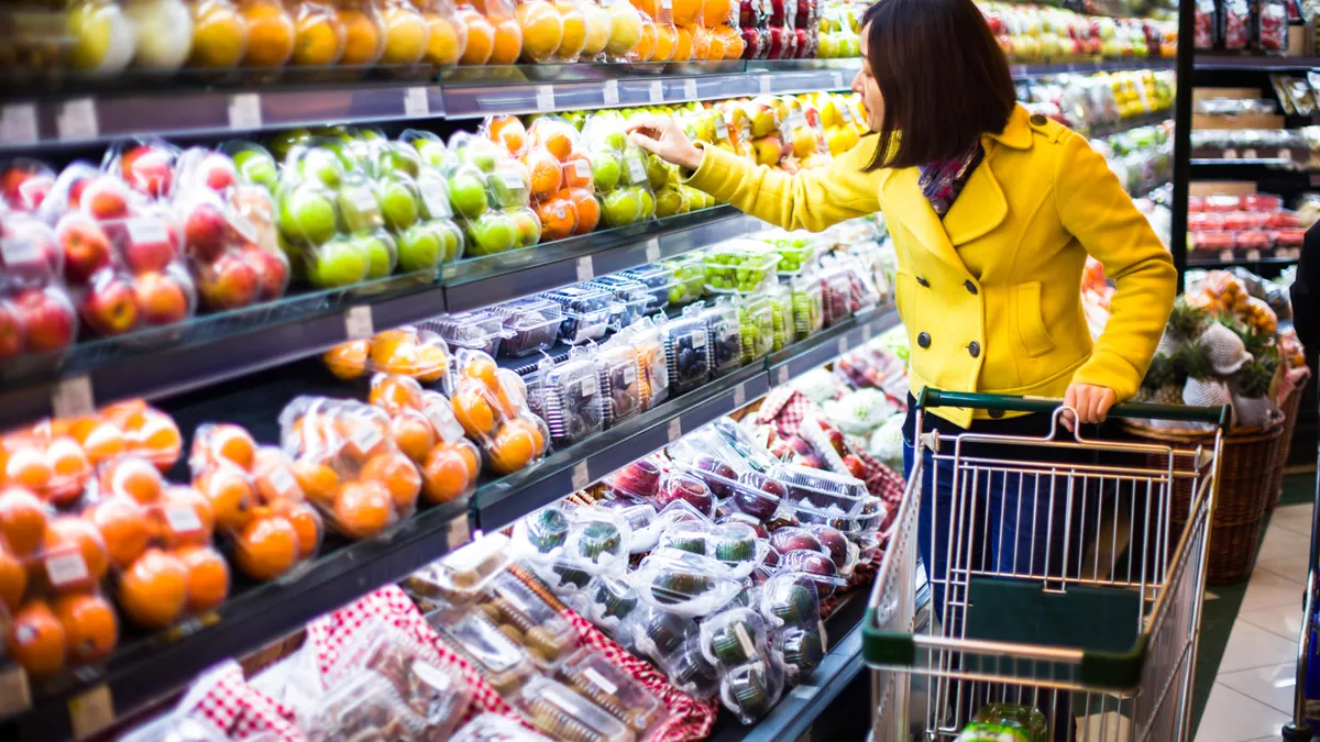 Women shopping in grocery retail's producer corner