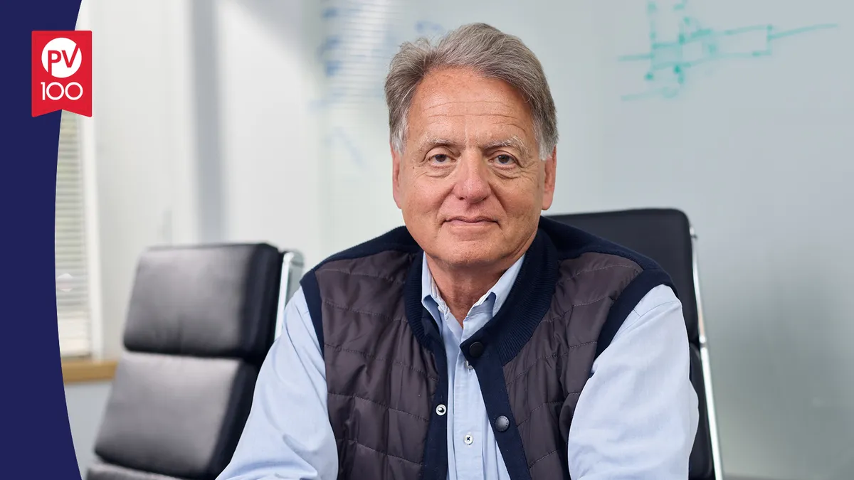 A portrait of Dr. Edward Kaye framed with a banner icon that reads "PV 100"