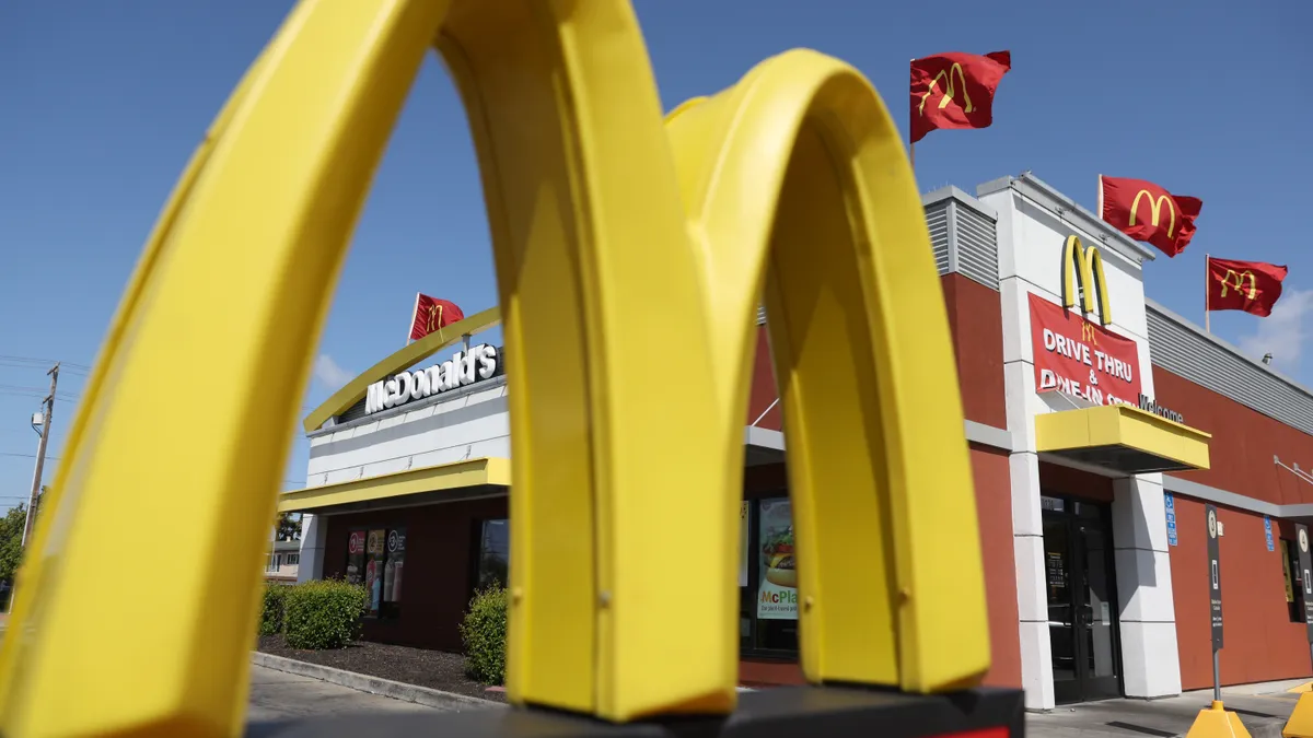 A sign is posted in front of a McDonald's restaurant on April 28, 2022 in San Leandro, California.