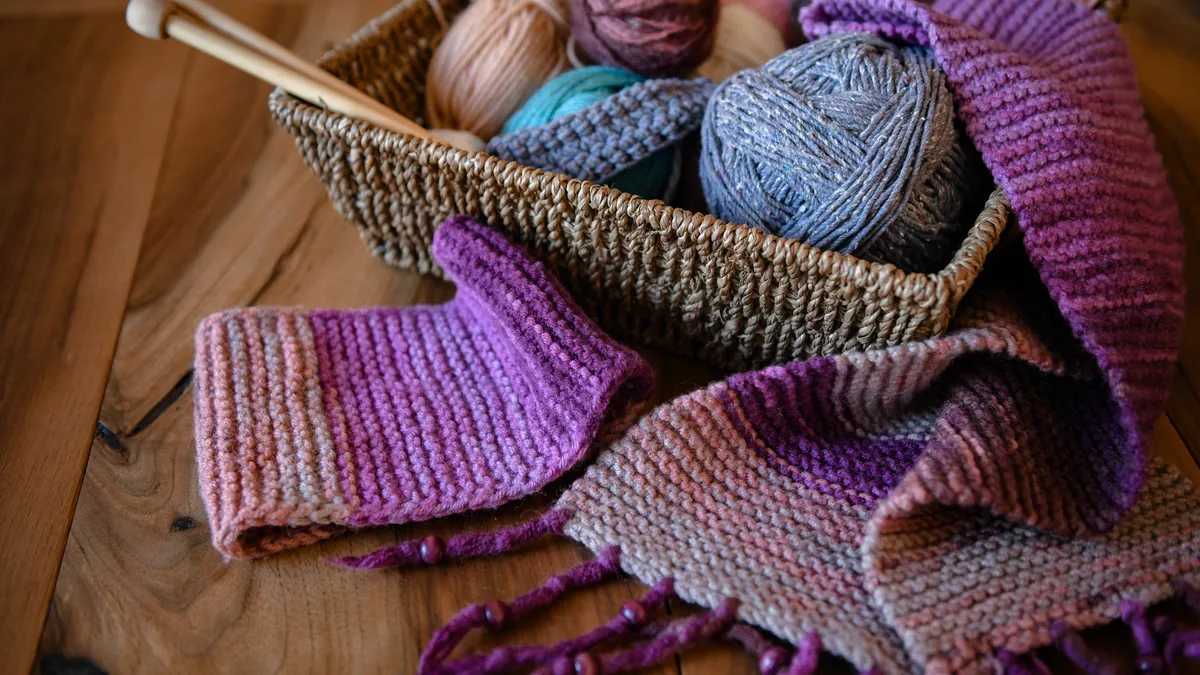 Shot of knitting supplies in basket