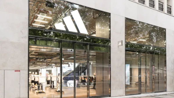 A stone Adidas storefront.