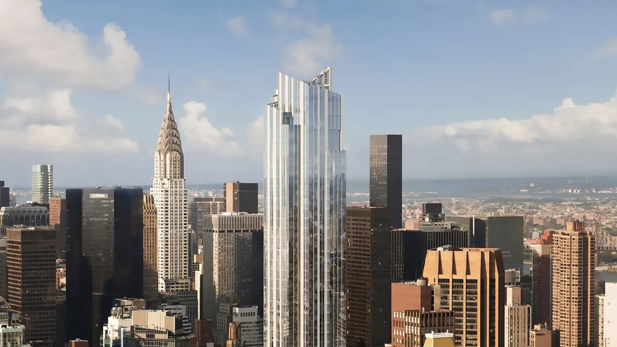 A tall steel and glass apartment building on the New York City skyline.