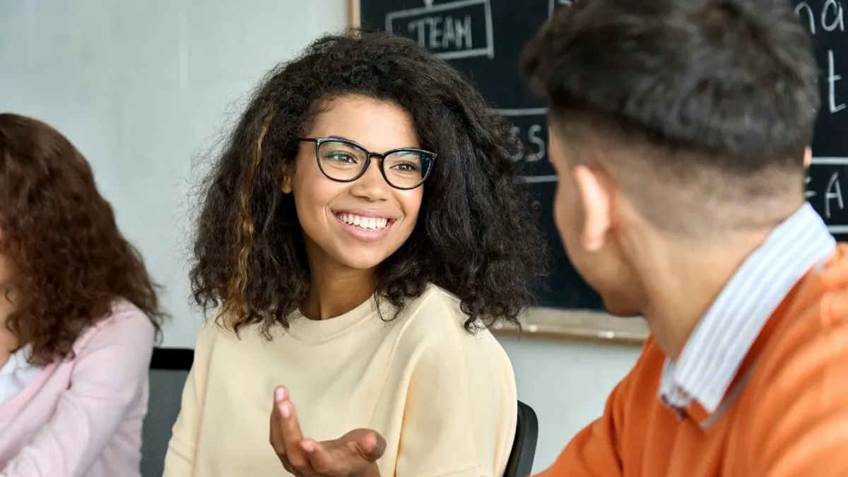 Man and woman engaging in discussion