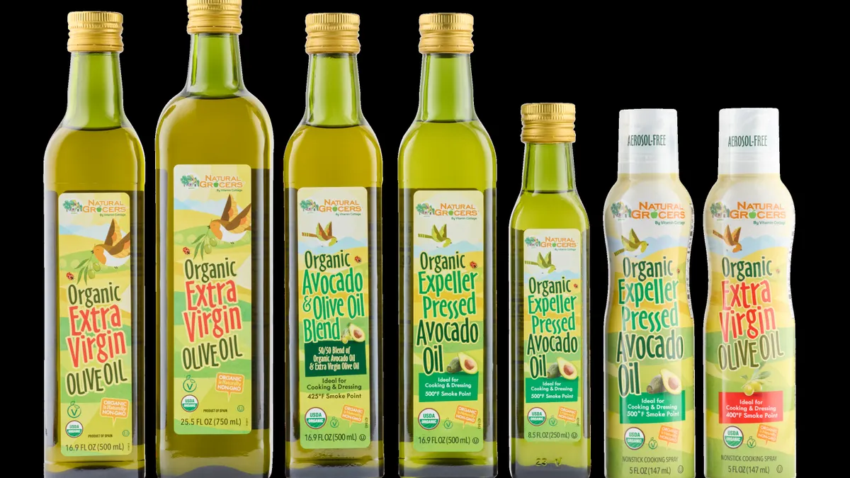 Bottles of cooking oil standing side by side