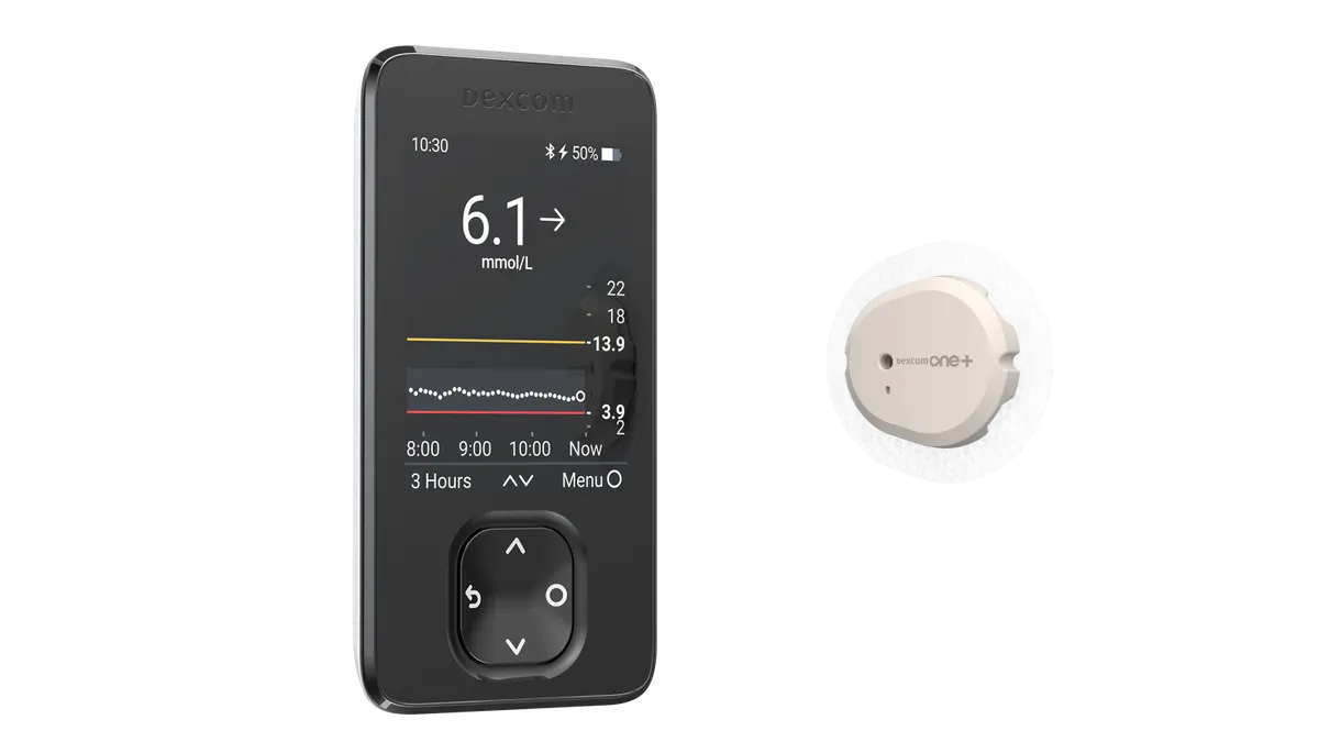 A black, rectangular device displays a blood glucose reading, while a white patch that says Dexcom One+ is to the right.