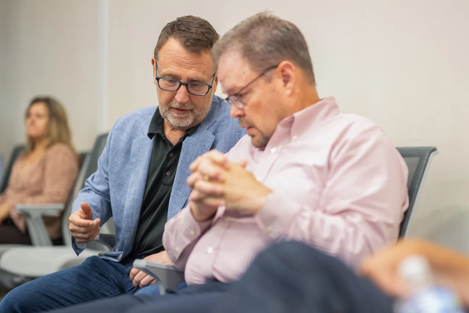 Rob Vitale speaks to Chief Information Officer Mike Sullivan before a town hall discussion at Post Holdings’ headquarters in St. Louis, Missouri.