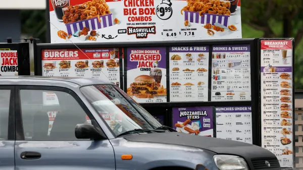 A customer orders food in the drive-thru at a Jack in the Box restaurant on April 25, 2025 in San Rafael, California.
