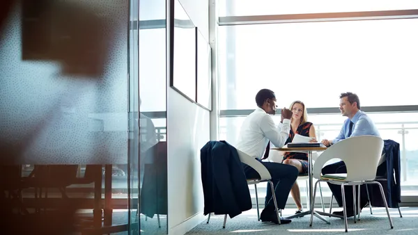 Shot of a group of businesspeople having a meeting in an office