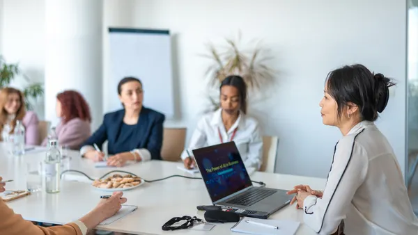 Diverse Business Executives Engaged in a Collaborative Meeting