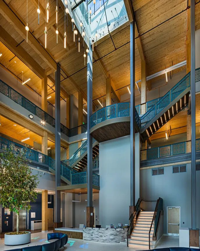 A shot of a tall staircase amid the backdrop of a nice interior.