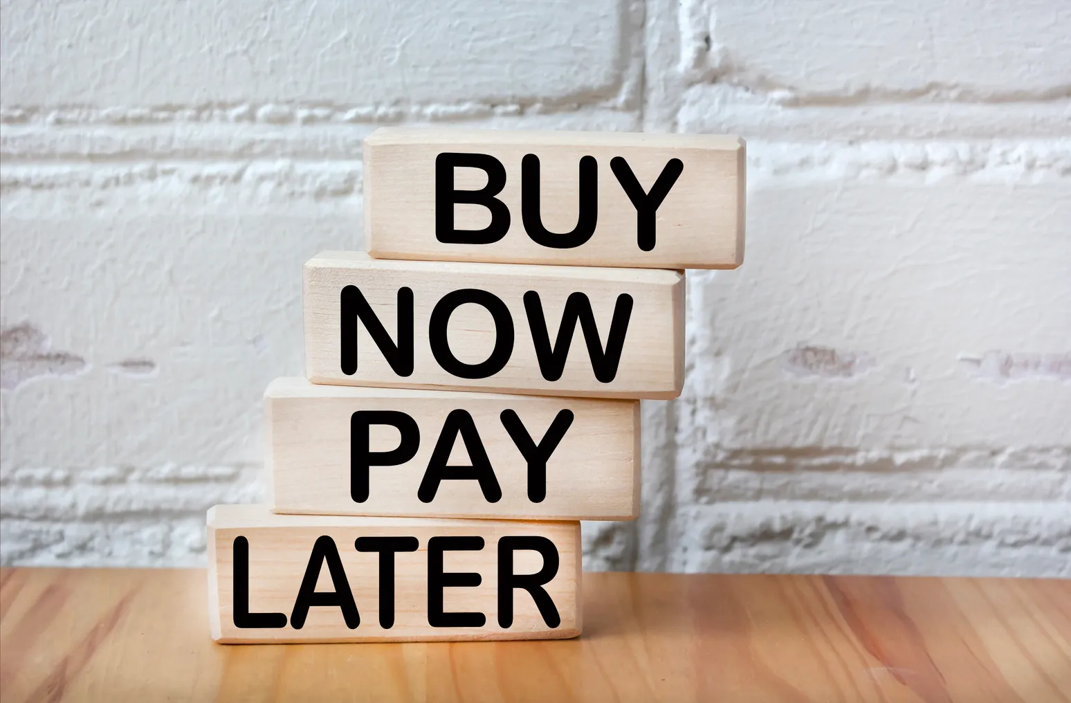 Blocks show the words "buy now pay later"