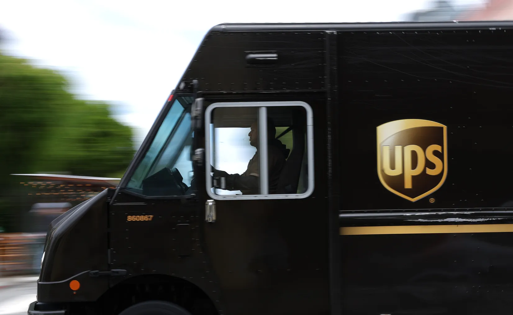 A UPS delivery truck drives through an intersection on June 12, 2023 in San Francisco, California.