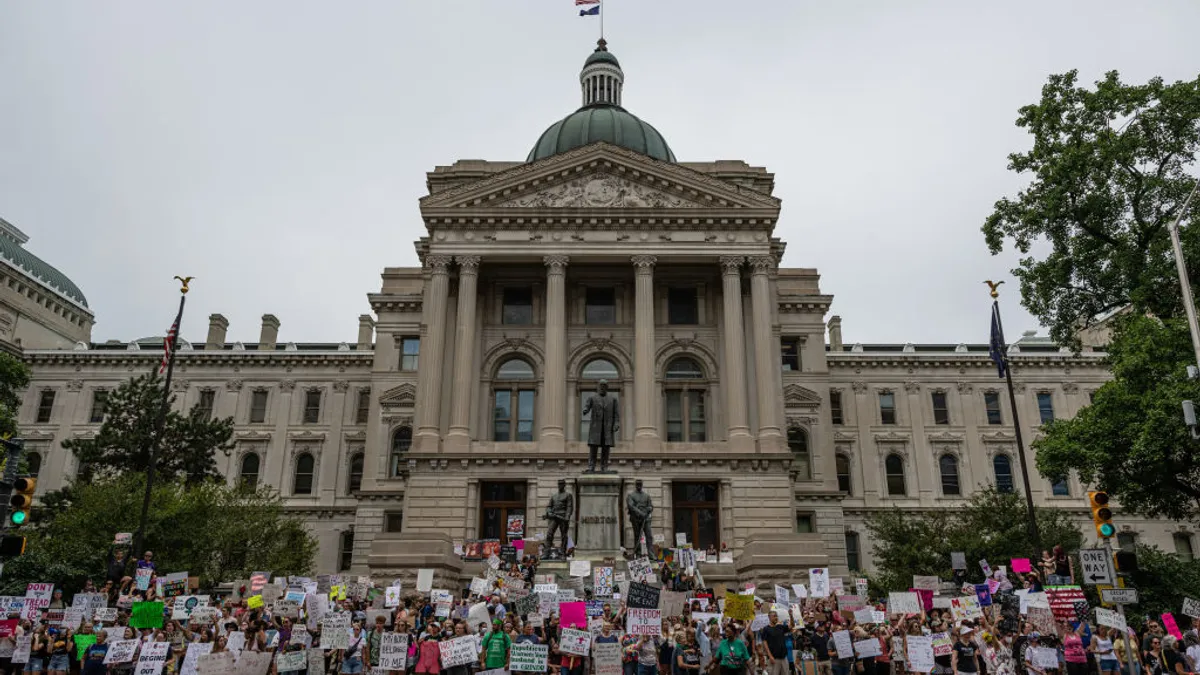 Protesters gather outside of Indiana State Capitol building on July 25, 2022 in Indianapolis, Indiana.