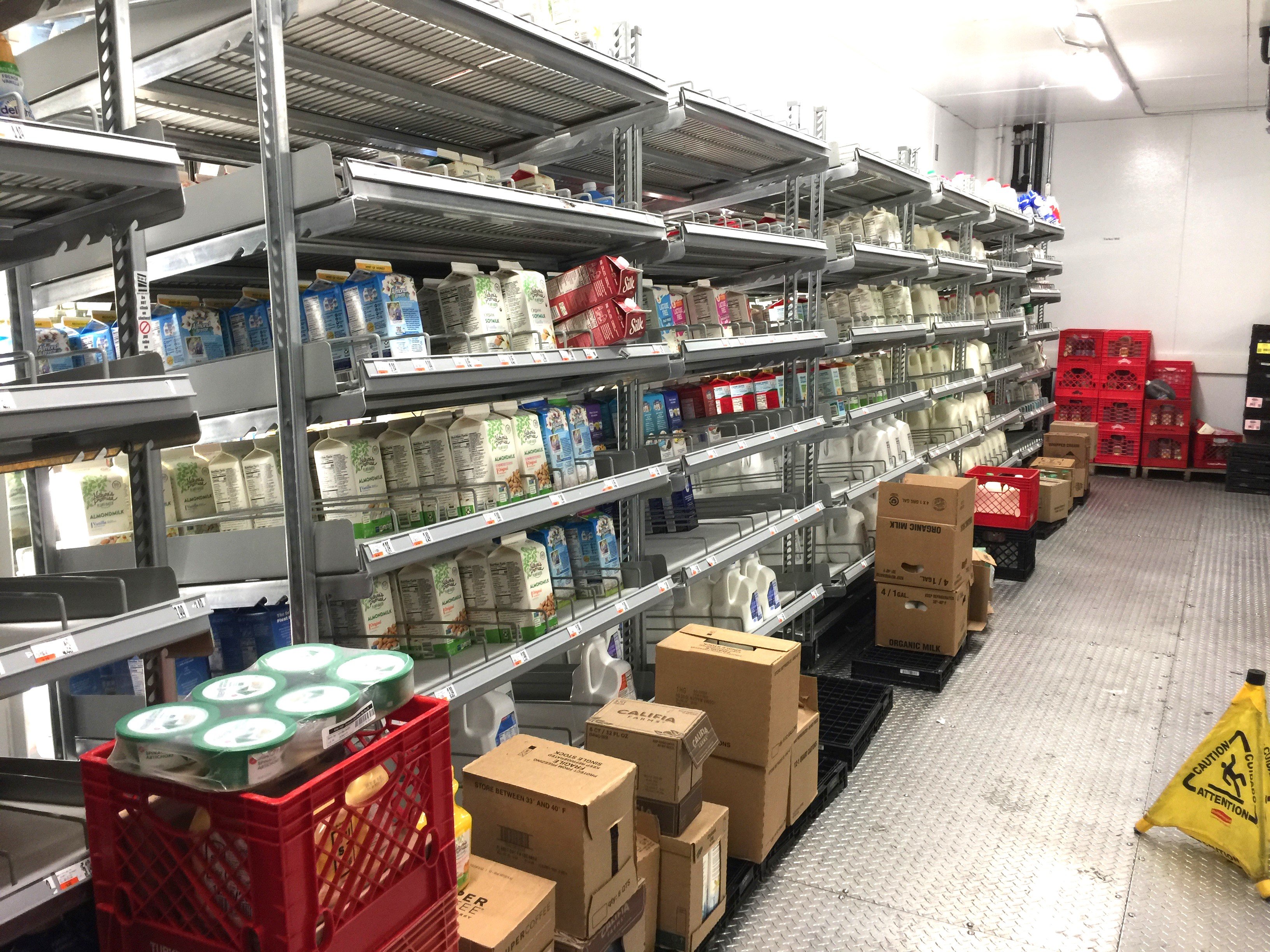 Milk in a grocery store storage room