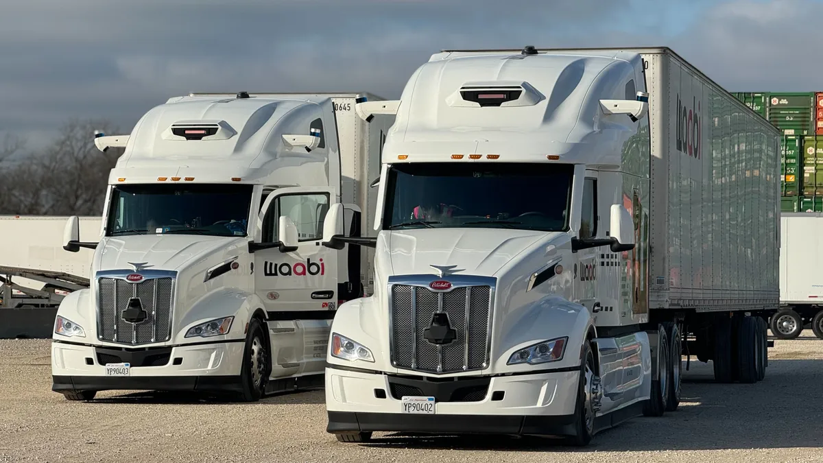 Two Waabi tractor-trailers shown side by side.