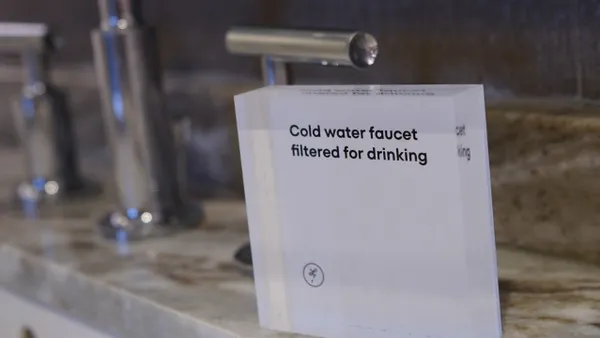 A sign at the L7 Chicago by Lotte hotel instructs guests that faucet water is filtered.