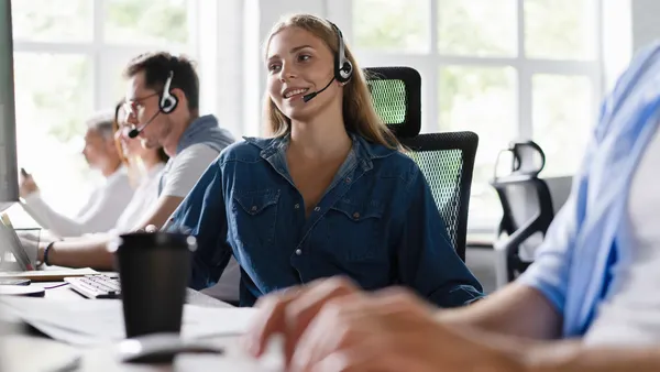Agent with headsets work in a contact center