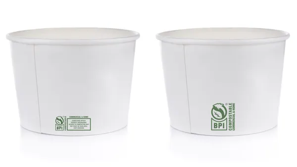 Two paper containers next to each other both have small, green labels indicating they are home and commercial compostable.