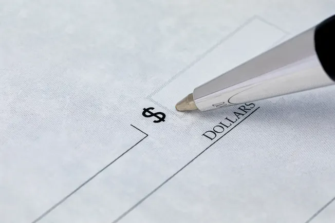 Texas charity’s ex-CFO sentenced in $2.1M mobile check scheme