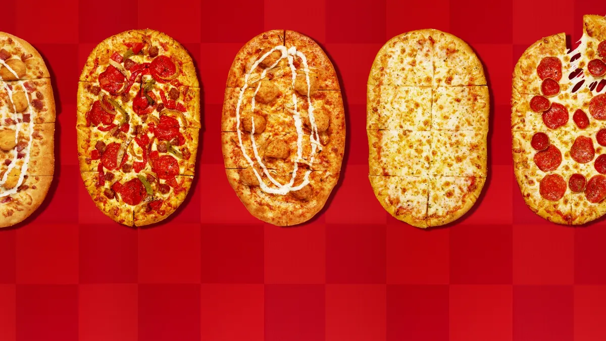 Five flat pizzas.