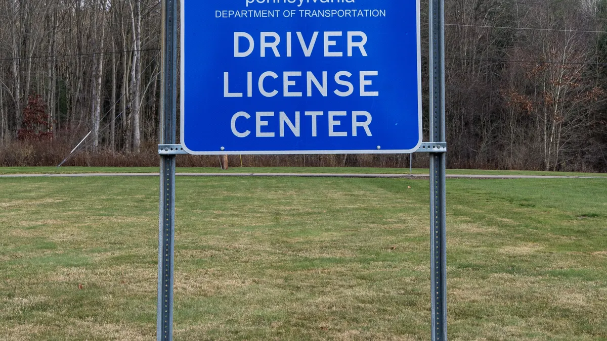 A sign for the Pennsylvania Department of Transportation, PennDot, driver license center