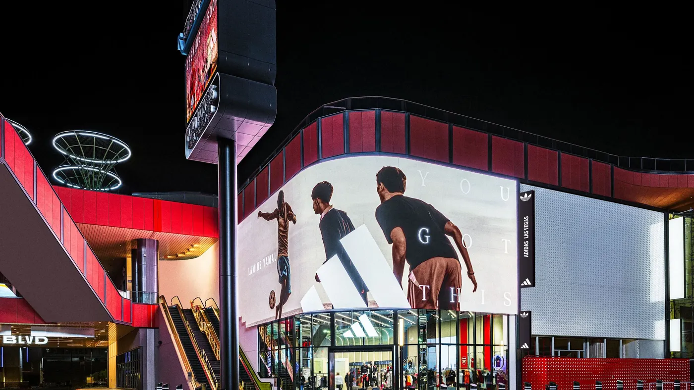 A corner Adidas store with a tall screen featuring the words "You Got This."