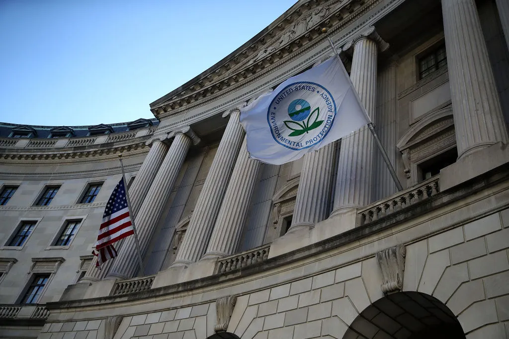 Exterior of the U.S. EPA headquarters with two flags flying