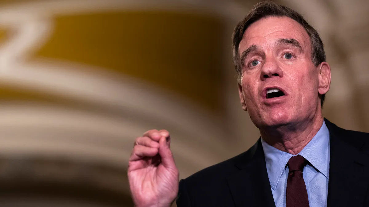 Sen. Mark Warner, D-VA, speaks in the Capitol building