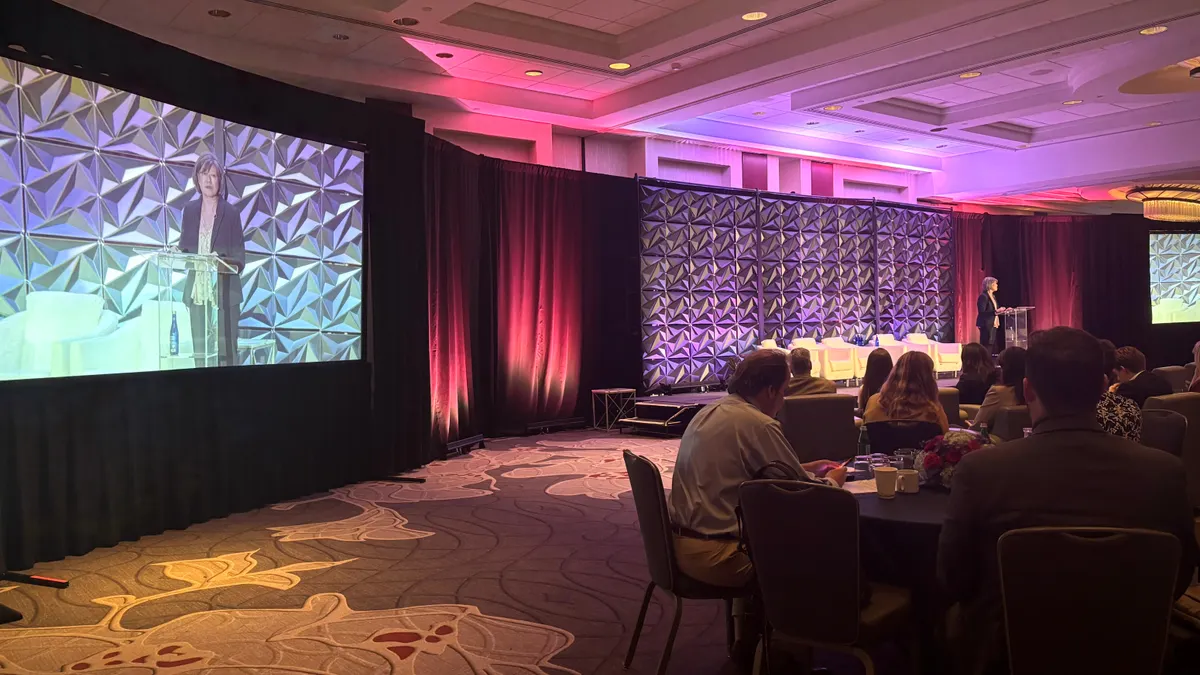 FERC Commissioner Judy Chang addresses the audience during a keynote speech at the Smart Electric Power Alliance’s Energy Evolution Summit on May 19.