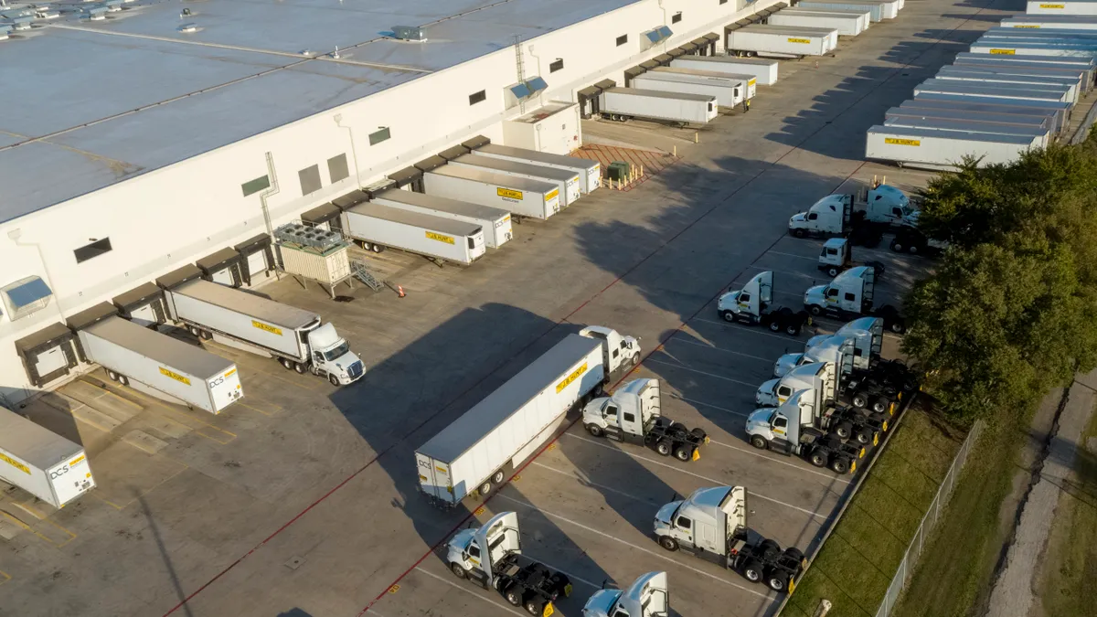 Overhead view of J.B. Hunt trucks at industrial facility