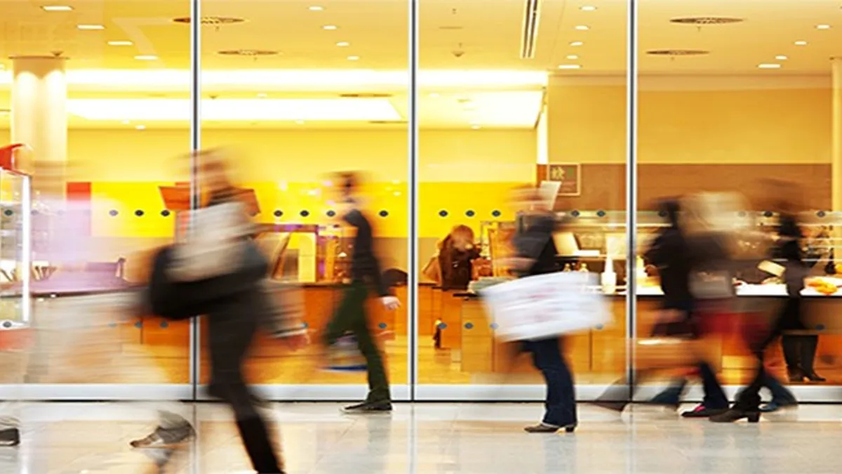 Intentional Blurred Image of People in Shopping Center