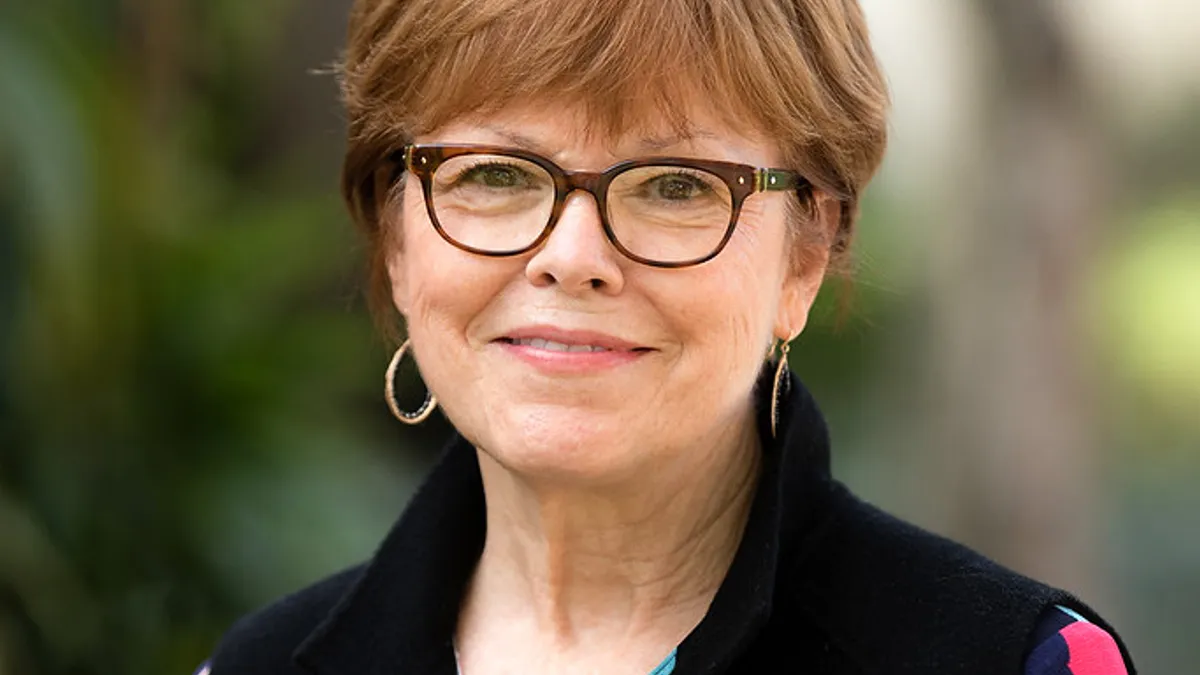 A headshot image of Susan Whealler Johnston.