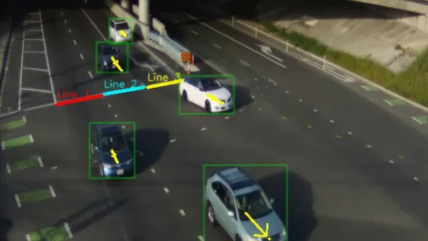 Screenshot of a camera looking down at vehicles on a roadway with boxes demarcating each car.