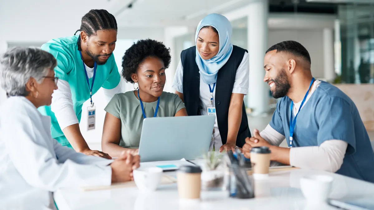 Teamwork, planning and meeting with doctors and laptop
