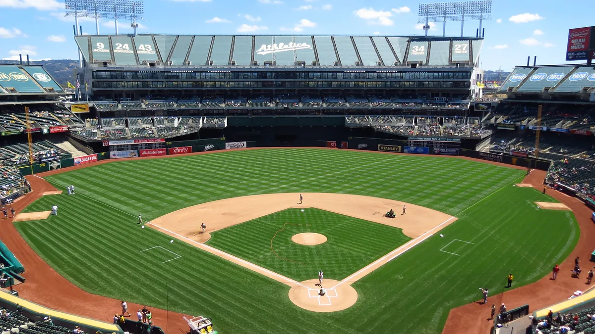 An elevated view from behind home plate of a major league ball park.