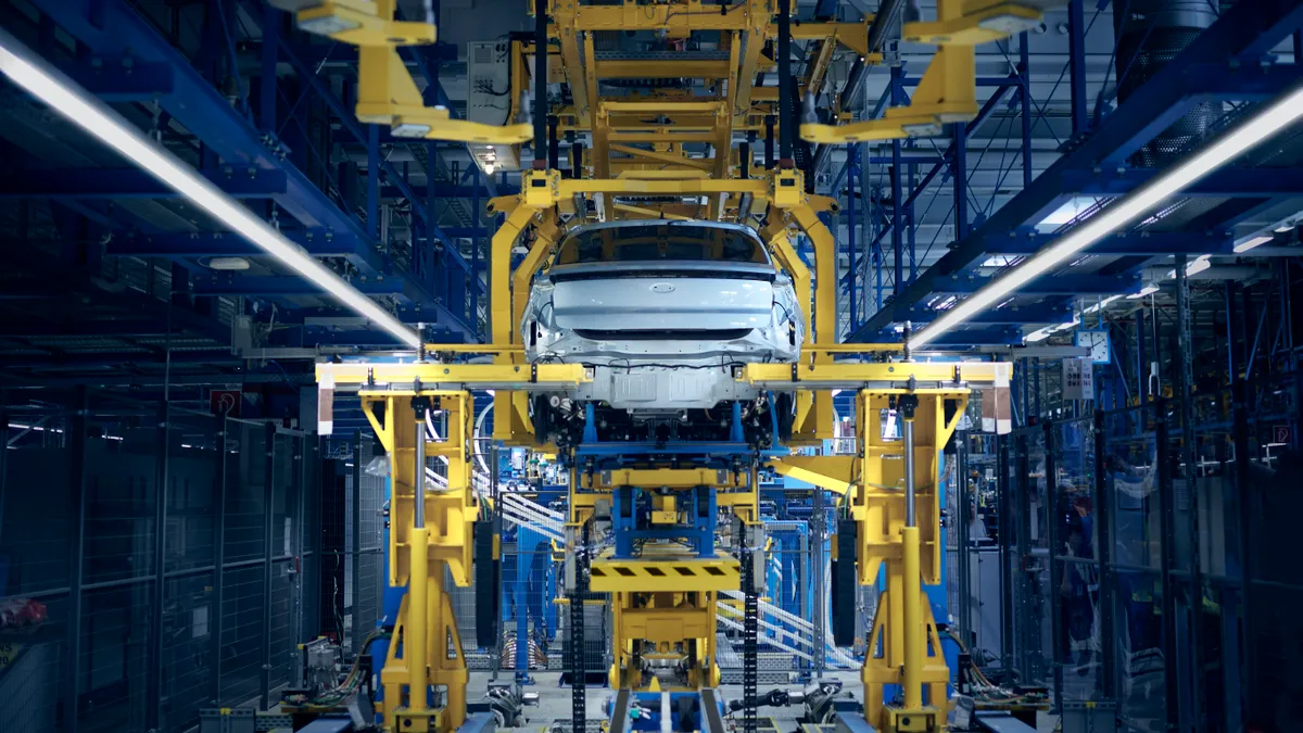 A vehicle on the assembly line at Ford's Cologne Electric Vehicle Center