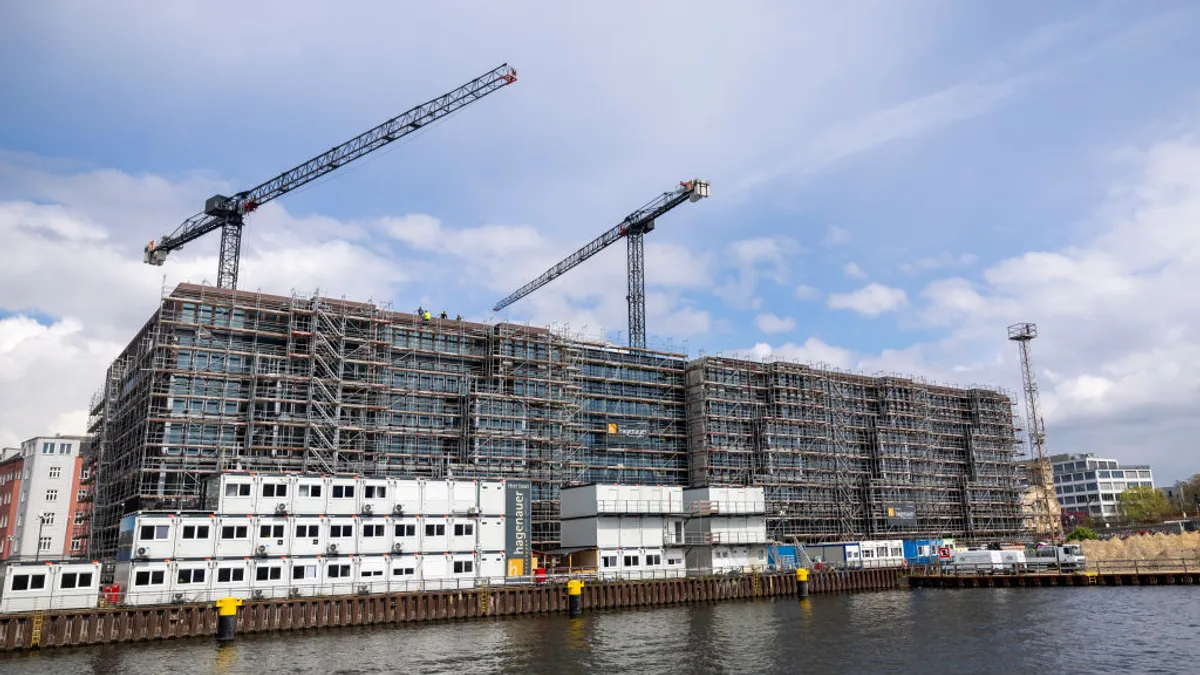 The construction site of a new residential apartment building stands near Spree river on April 25, 2024 in Berlin, Germany.