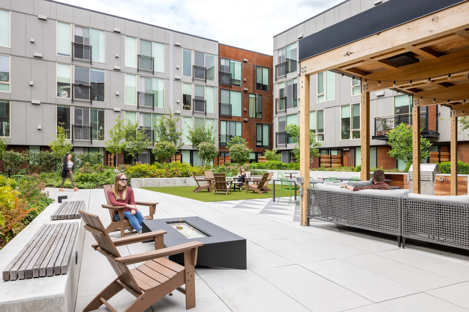 A courtyard surrounded by apartments.