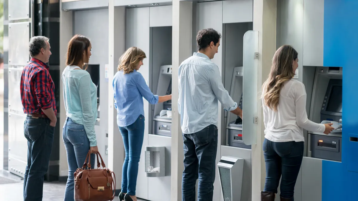 People in line at an ATM