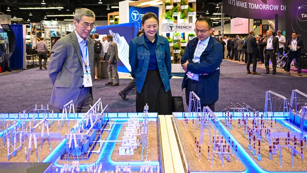 Attendees of an event posing for a picture.