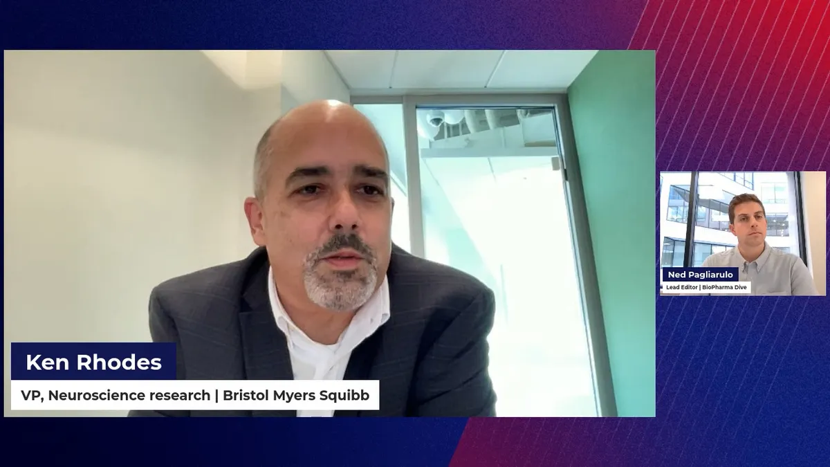 An executive answers questions from a reporter in this screenshot image of a virtual webinar.
