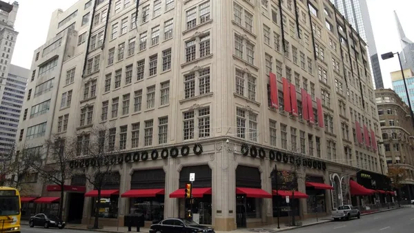 A massive downtown department store building.