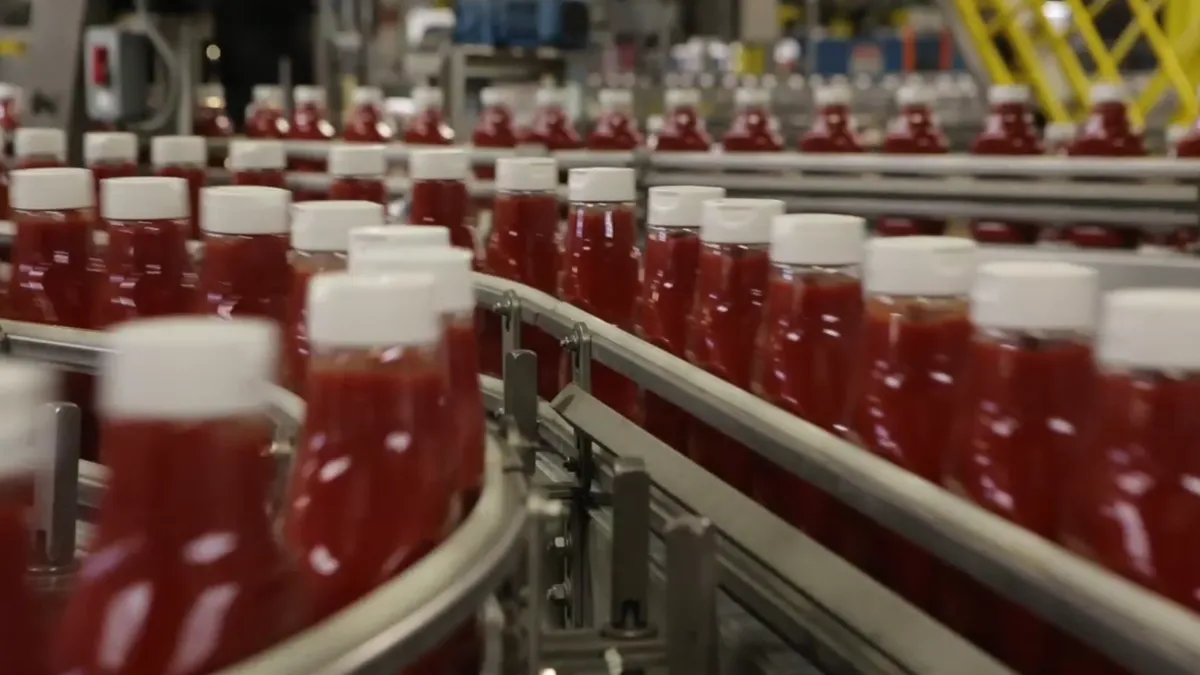 A still frame from a video of manufacturing Kraft Heinz ketchup.