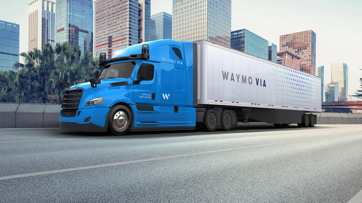 A Daimler Cascadia fitted with Waymo technology and branding