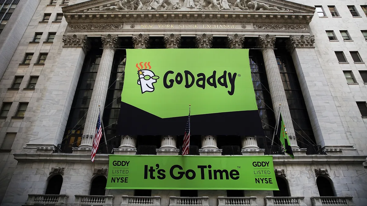 GoDaddy banner hangs outside of the New York Stock Exchange