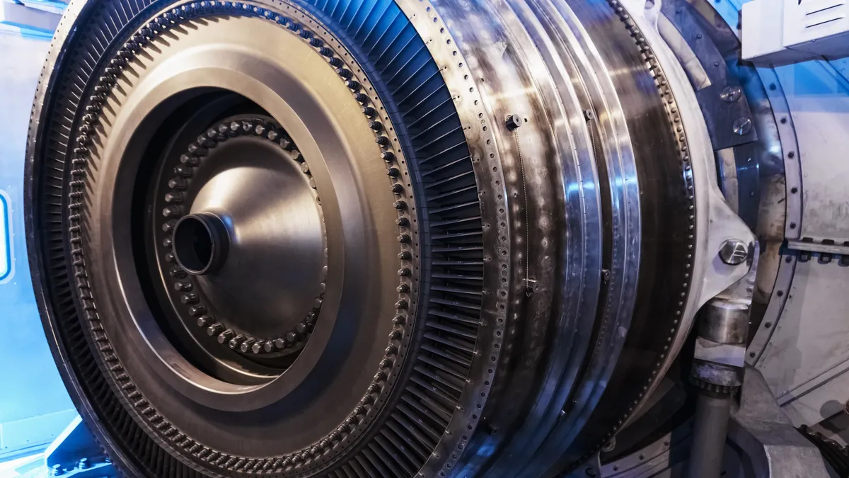 Turbine generator rotor with blades and discs, interior view.