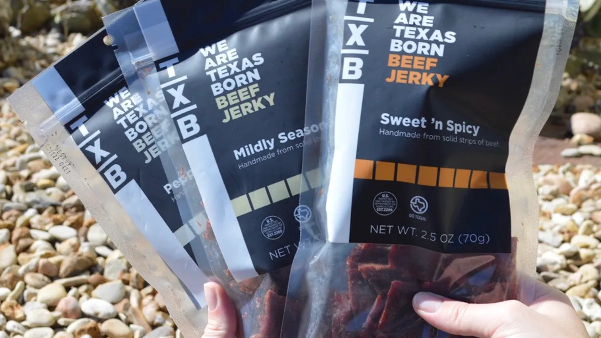 A photo of several flavors of TXB-brand beef jerky.